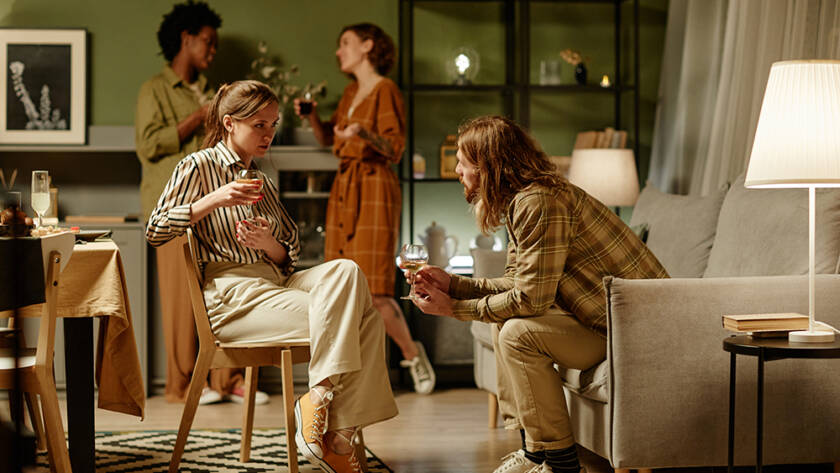 Young people gathered in a living room