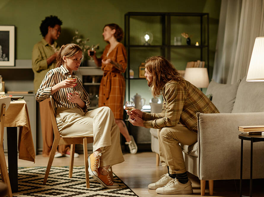 Young people gathered in a living room