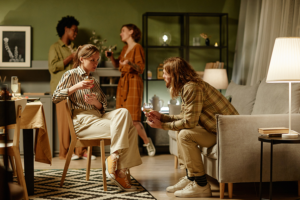 Young people gathered in a living room