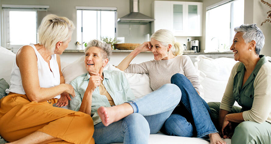 Older adults sitting on a couch